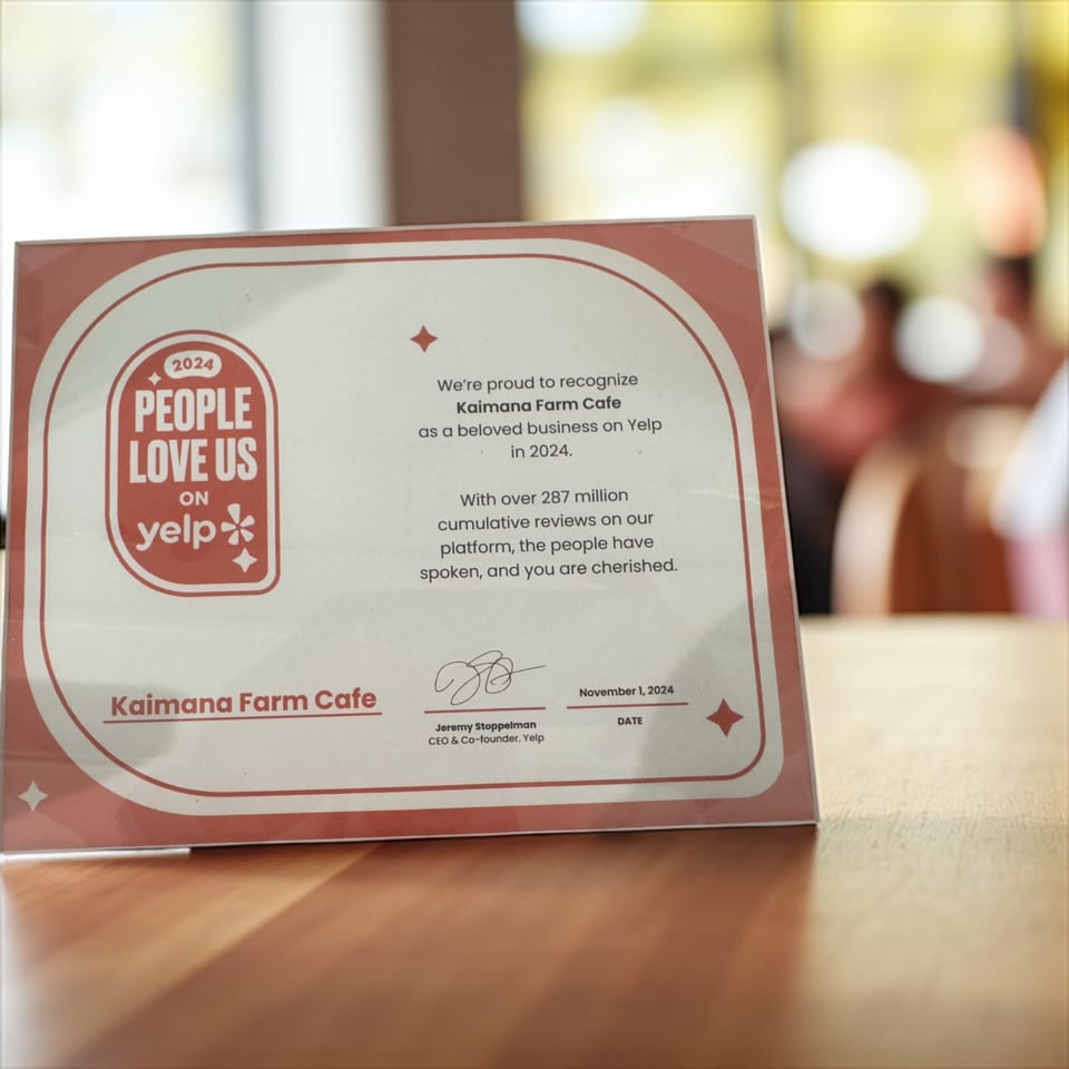 A Yelp "People Love Us" award for Kaimana Farm Cafe, recognizing it as a beloved business in 2024.