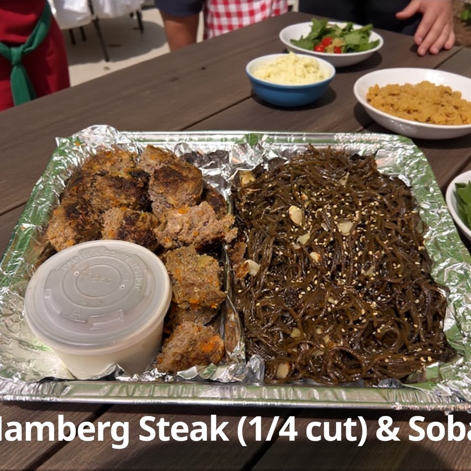 Kaimana Farm Cafe's healthy Hamburg Steak and Soba, with sides of salad and mashed potatoes.